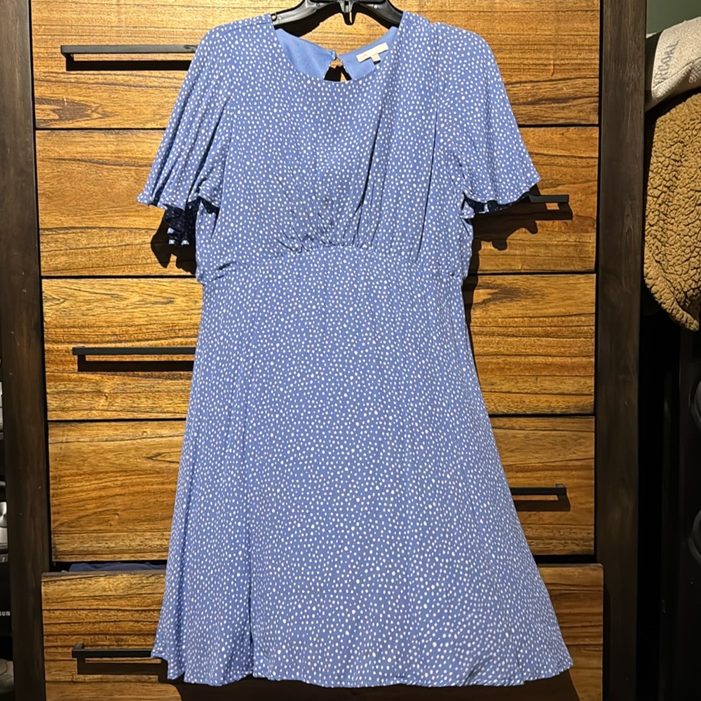 White polka dot open back mini dress